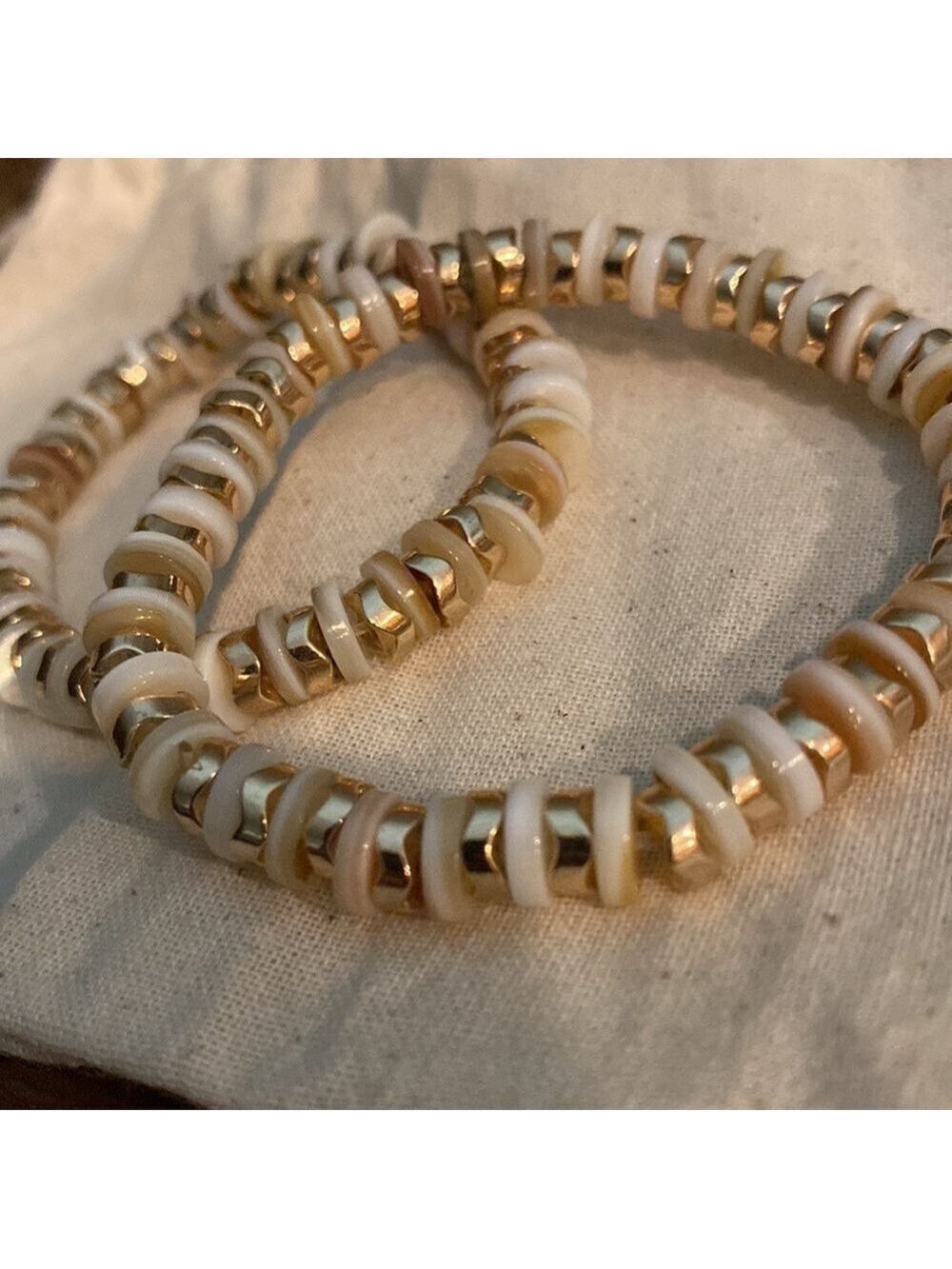 715. One Handcrafted White Shell & Gold Colour Beaded Stretchy Bracelets